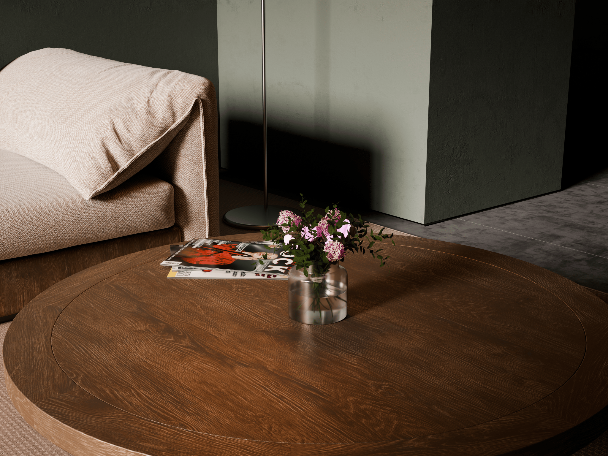 Coffee-table detail with flowers, magazines, soft furnishings, and directional light